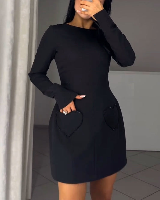 Elegancka sukienka z długim rękawem i ściągaczem w talii